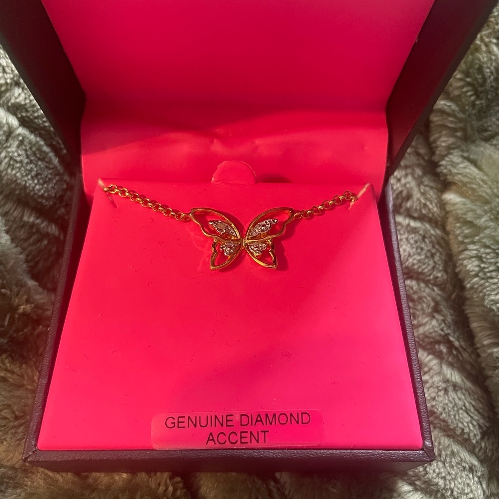 Gold butterfly shaped necklace